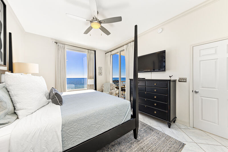 The master bedroom features access to the balcony.